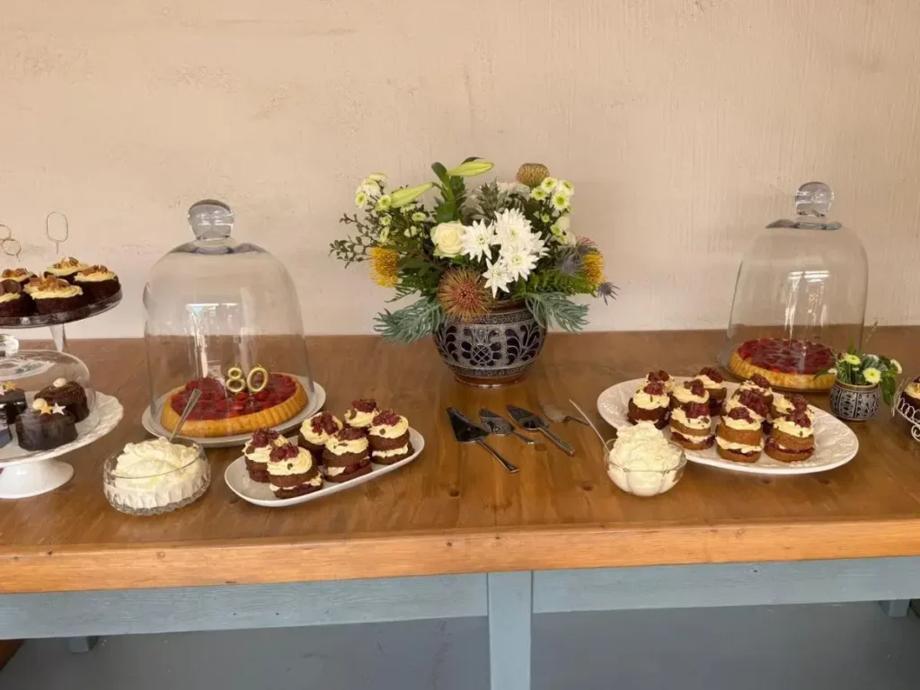 Table with cakes for afternoon tea.