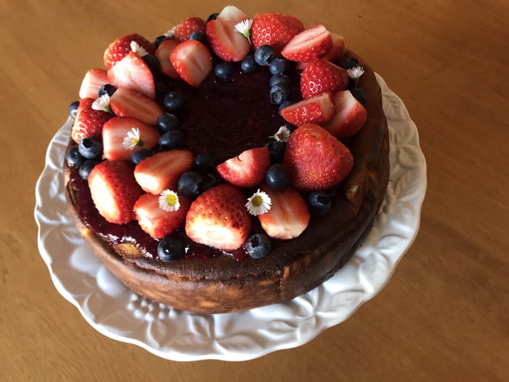 Decorated Cheesecake with strawberries and blueberries