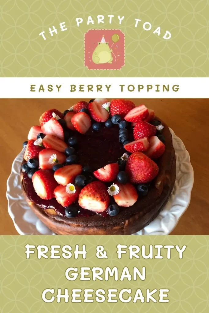 German Cheesecake Recipe topped with berry sauce, fresh strawberries, and blueberries.