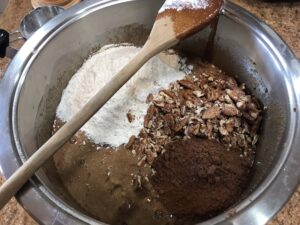 Chocolate and Pecan Nut Brownies - Gently fold in the flour, cocoa powder and pecan nuts until fully combined.