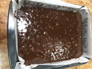 Brownies Pour into Roasting Dish lined with baking paper