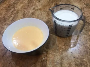 Dr. Oetker Vanilla Pudding Powder and sugar mixed with cold milk