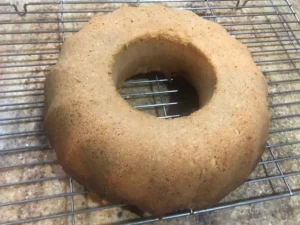 Baked Frankfurter Kranz cake cooling on a wire rack