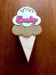 Use foam tape to attach the name tag