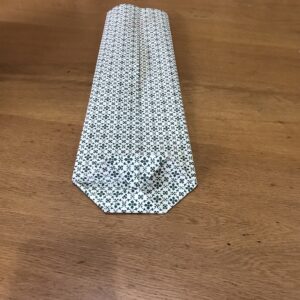 DIY Bottle Gift Wrapping - fold the top and bottom points to meet in the center.