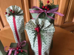 DIY bottle gift wrapping with ribbon and wrapping paper