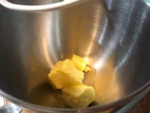 Butter added to a mixing bowl for nutella icing