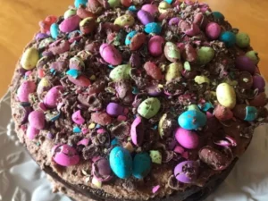 Decorated Easter Chocolate Cake topped with mini eggs.