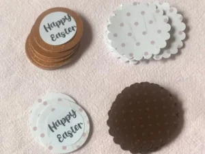 Stack of “Happy Easter” tags and scalloped paper circles.
