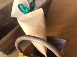 Close-up of Easter carrot favour in basket