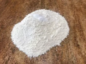 Flour placed on a kitchen work surface for making German tea biscuit dough