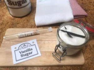 Vanilla sugar and label on a wooden board