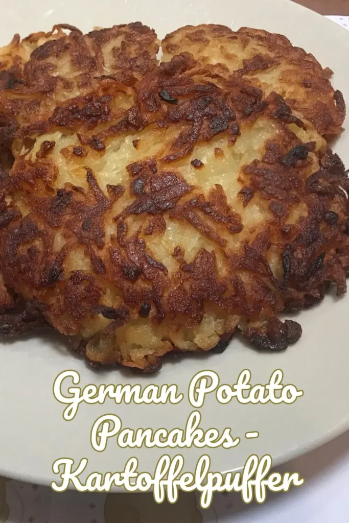 Plate of crispy German potato pancakes (Reibekuchen)