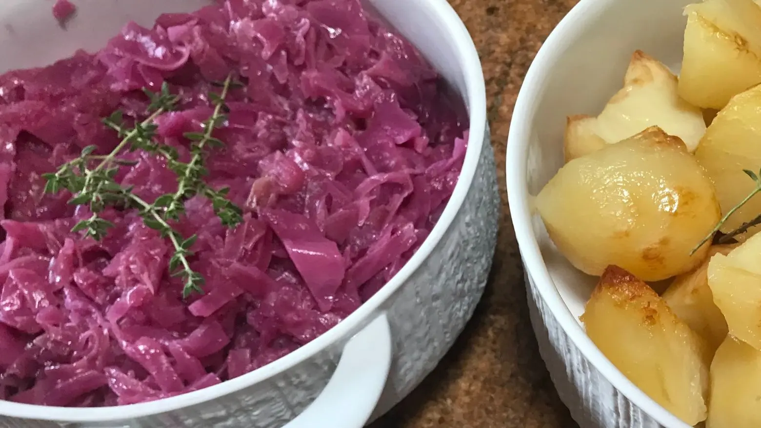 Close-up of German red cabbage with roasted potatoes