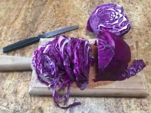 Slicing fresh red cabbage for German Rotkohl recipe