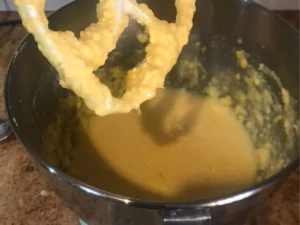 Ottilienkuchen batter in mixing bowl after adding sugar and eggs
