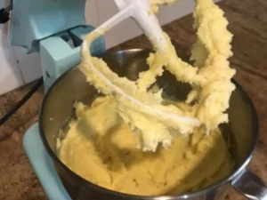 Butter and sugar being creamed together for chocolate or vanilla cupcakes