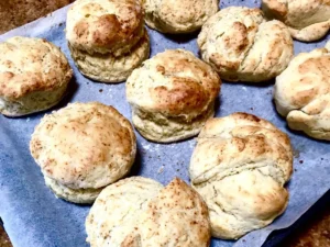 Light and golden butter scones freshly baked on a tray