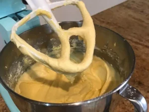 Cupcake batter being mixed after adding flour