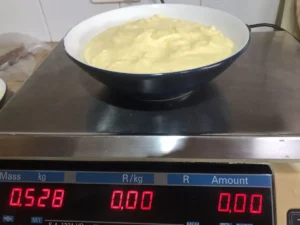 Measuring cupcake batter to split into chocolate and vanilla