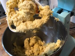 Flour added to creamed butter and sugar mixture in mixer