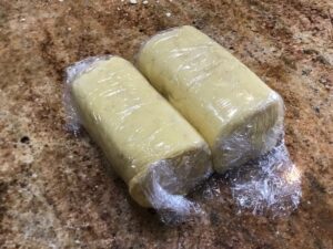 Wrapped shortbread dough logs ready for chilling