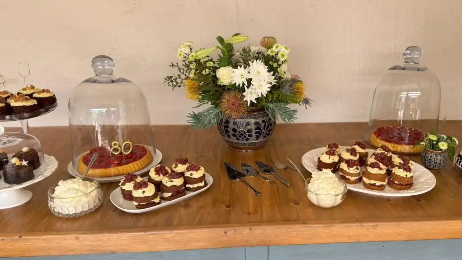 Table with cakes for afternoon tea.