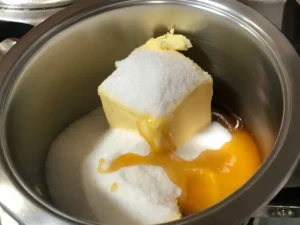 Russian squares recipe ingredients butter sugar and syrup in a saucepan