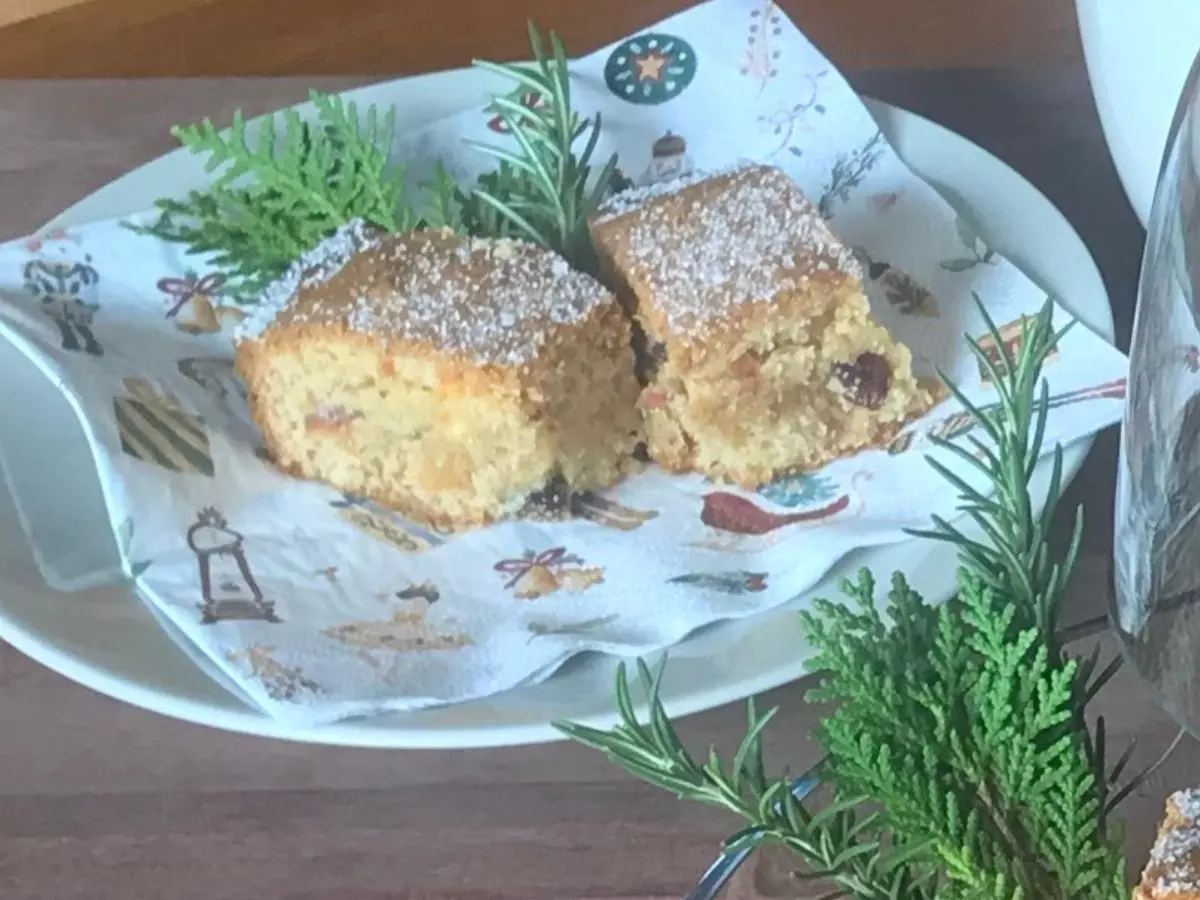 Russian squares recipe cut into buttery fruit squares and dusted with sugar