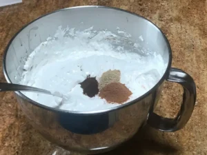 Egg whites whipped with sugar and spices for Pfefferkuchen batter