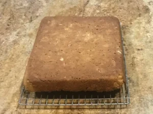 Baked rusks cooling on a cooling rack.