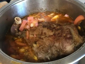 Add tomatoes to Leg of Lamb Pot Roast