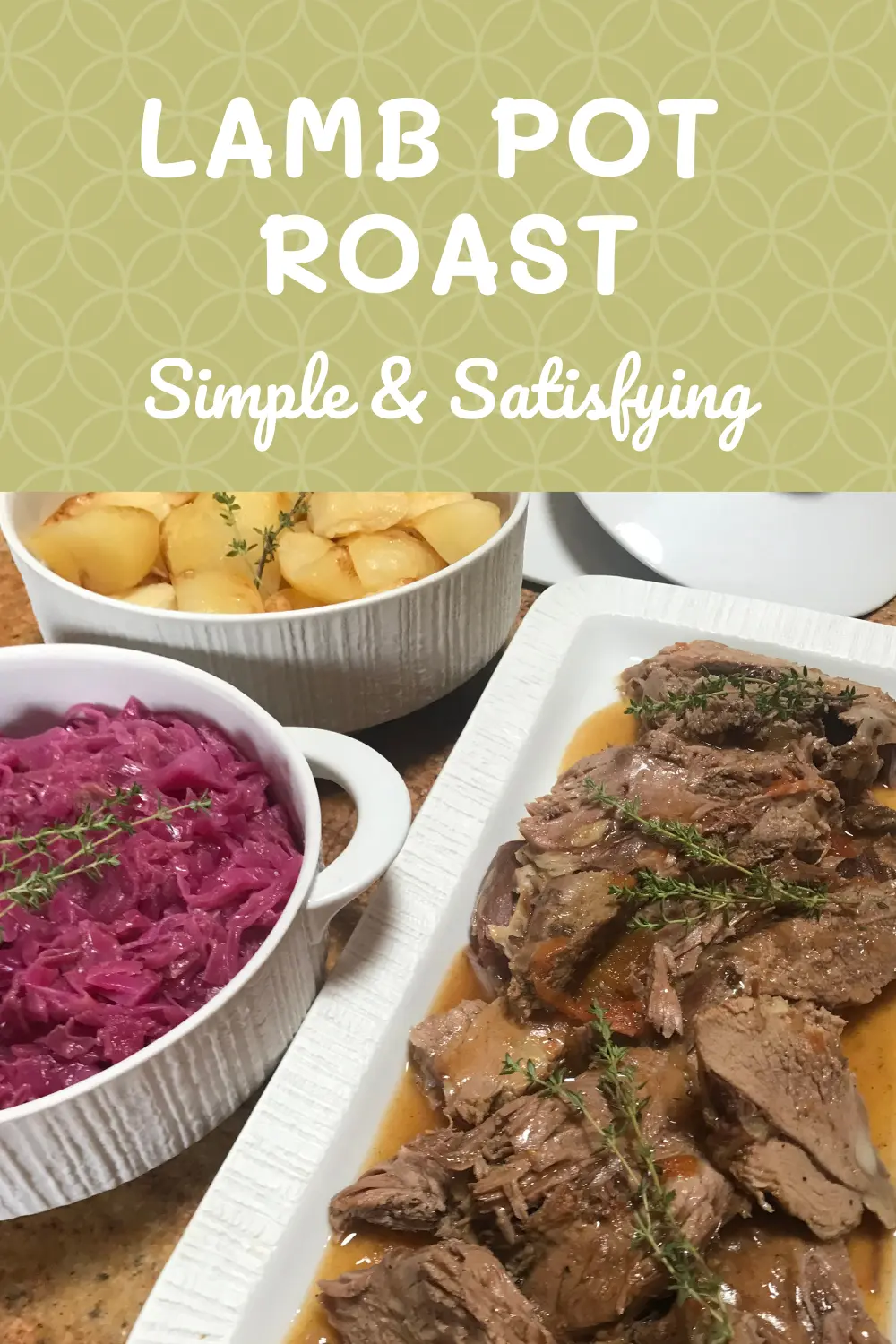 Leg of lamb pot roast served with red cabbage and roast potatoes