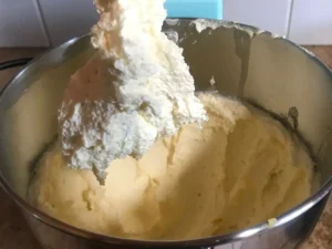 Milk being added to the browned butter and sugar mixture
