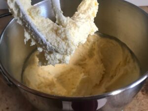 Creamy browned butter with sugar and vanilla sugar being added