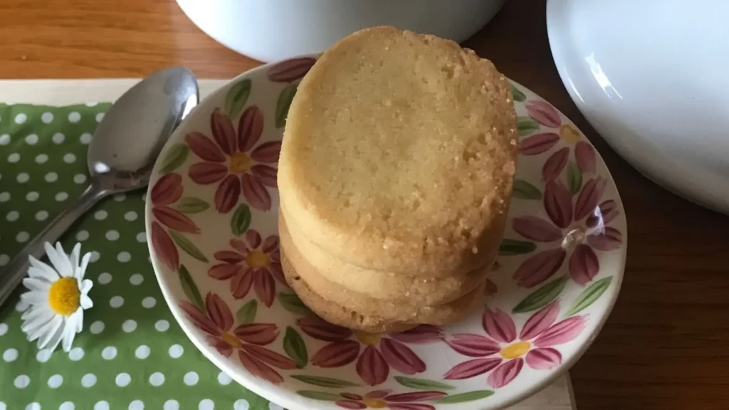 Finished Heidesand (German browned butter cookies) stacked on a plate