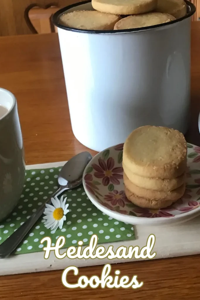 Finished Heidesand (German browned butter cookies) stacked on a plate