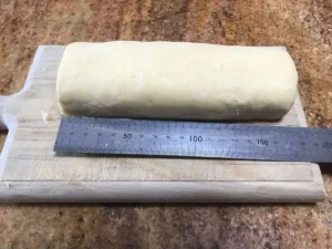 Cookie dough log with a ruler